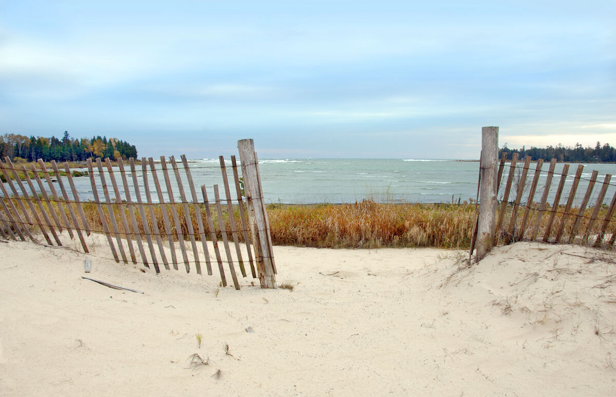 Fence on a beach in Door County, Wisconsin. Lake Michigan