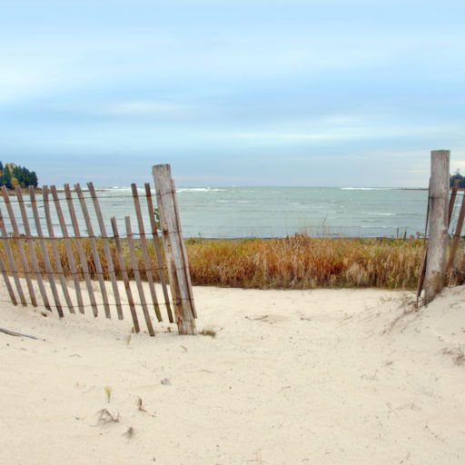 Fence on a beach in Door County, Wisconsin. Lake Michigan