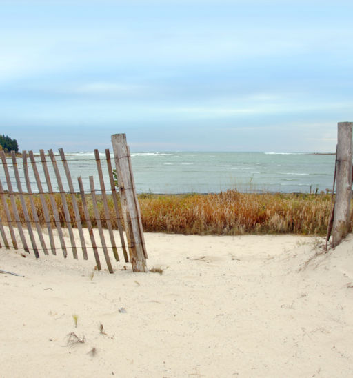 Fence on a beach in Door County, Wisconsin. Lake Michigan