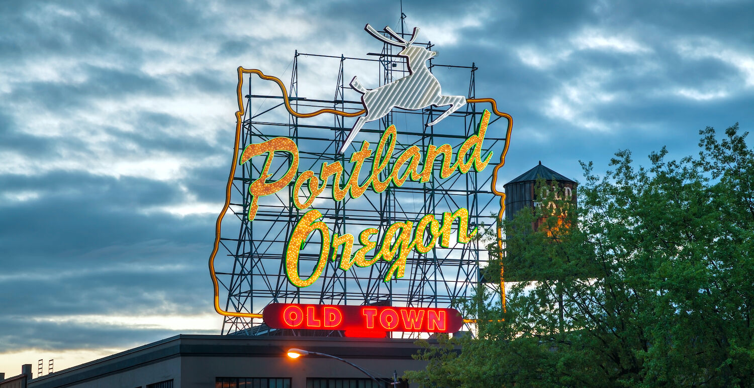 Famous Old Town Portland Oregon neon sign on May 05, 2014 in Portland, Oregon. The sign faces westbound traffic as it enters downtown Portland coming across the Willamette River.