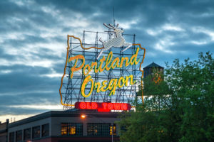 Famous Old Town Portland Oregon neon sign on May 05, 2014 in Portland, Oregon. The sign faces westbound traffic as it enters downtown Portland coming across the Willamette River.