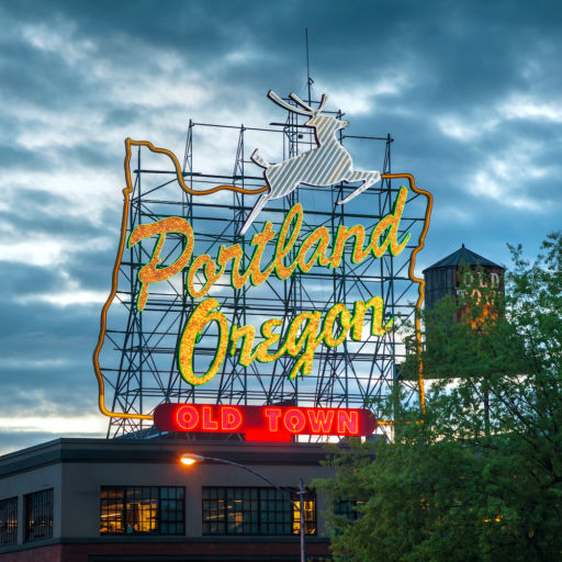 Famous Old Town Portland Oregon neon sign on May 05, 2014 in Portland, Oregon. The sign faces westbound traffic as it enters downtown Portland coming across the Willamette River.
