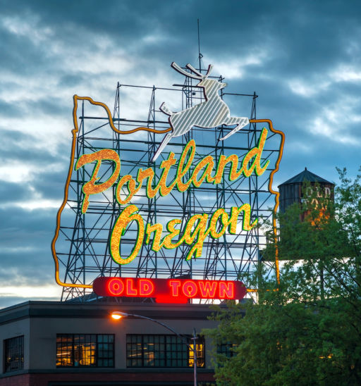 Famous Old Town Portland Oregon neon sign on May 05, 2014 in Portland, Oregon. The sign faces westbound traffic as it enters downtown Portland coming across the Willamette River.