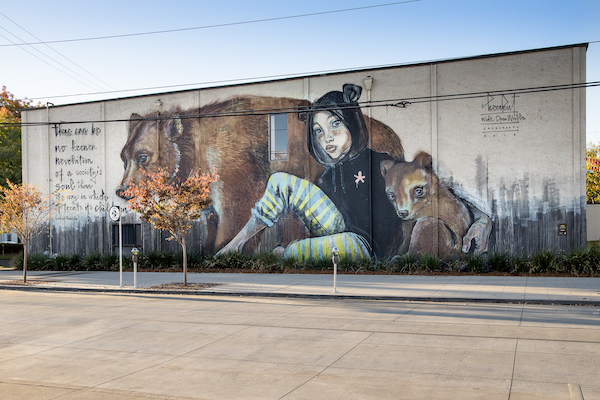 Sacramento is the most underrated street art scene in America. The Herakut mural that Delgado cites as his favorite in Sac right now.