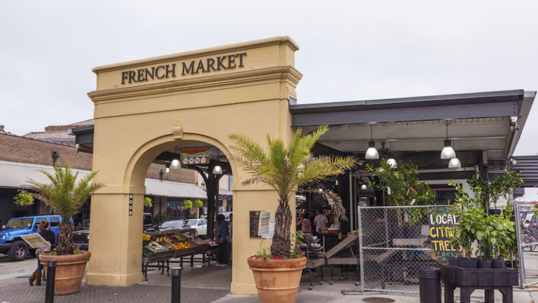 Traditional French Market at the French Quarter in the city of New Orleans, Louisiana. Photo via Shutterstock.