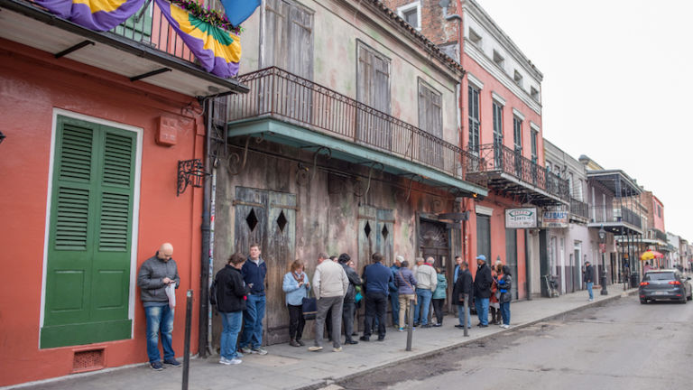 People wait in line outside of Preservation Hall in New Orleans. Photo by Shutterstock.