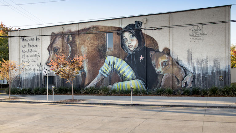 Mural created by street artist duo Herakut for 2018's Wide Open Walls in Sacramento, Calif. Photo by Mike Stalter.