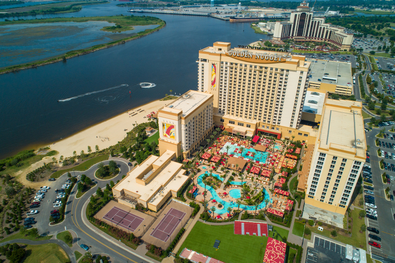 LAKE CHARLES, LOUISIANA - AUGUST 1, 2018: Aerial drone photo Golden Nugget Casino Resort Lake Charles, Louisiana. Photo by Shutterstock.