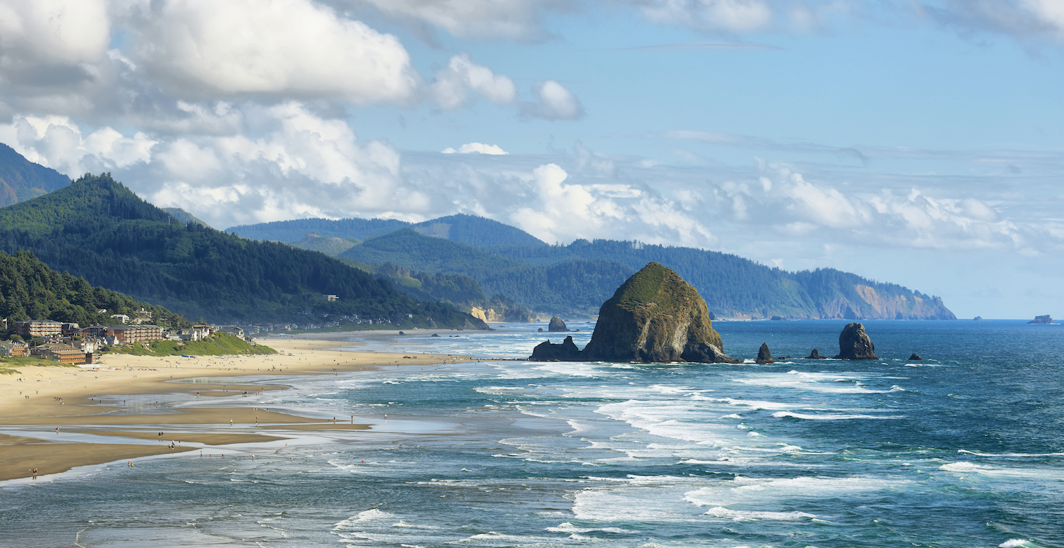 View of Cannon Beach in Oregon with Haystack Rock in the background.