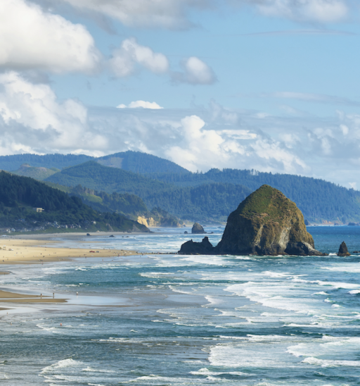 View of Cannon Beach in Oregon with Haystack Rock in the background.