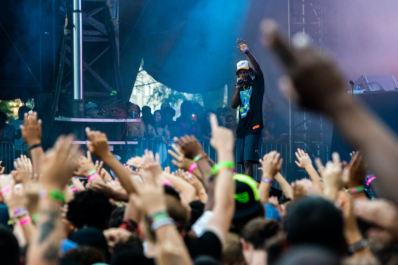 Chicago, Illinois - August 1st, 2019. Chicago native rapper Saba performs at Lollapalooza in Grant Park, Chicago. Photo via Shutterstock.