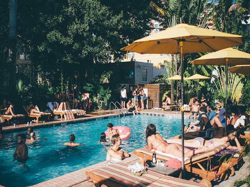 People around the pool at the Freehand Miami