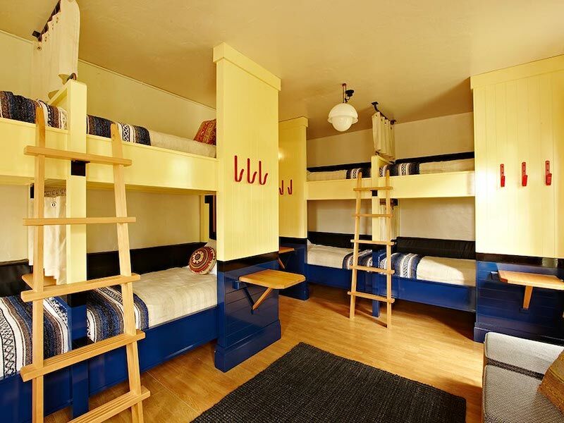 Room with eight bunks at the Freehand Miami