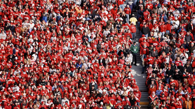 Madison WI. University of Wisconsin Badger football fans. Photo by Shutterstock.