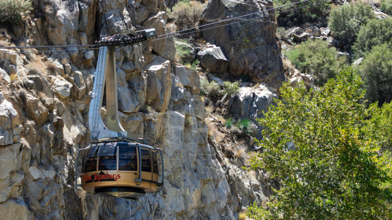 PALM SPRINGS, CALIFORNIA, USA - August 7, 2021: The Palm Springs Aerial Tramway moves through Chino Canyon in the San Jacinto Mountains.