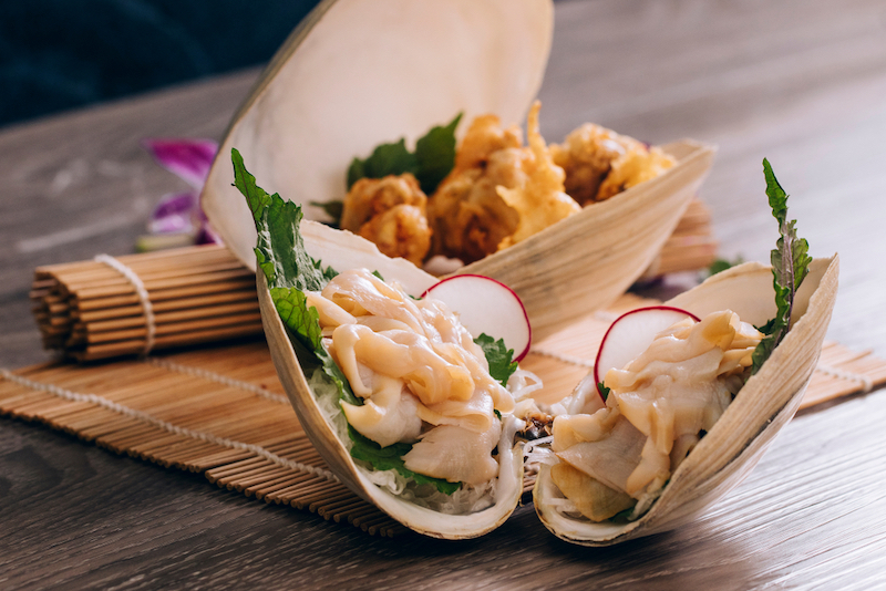 Pacific geoduck Elephant Trunk Clam Sashimi and Tempura. Photo via Shutterstock.