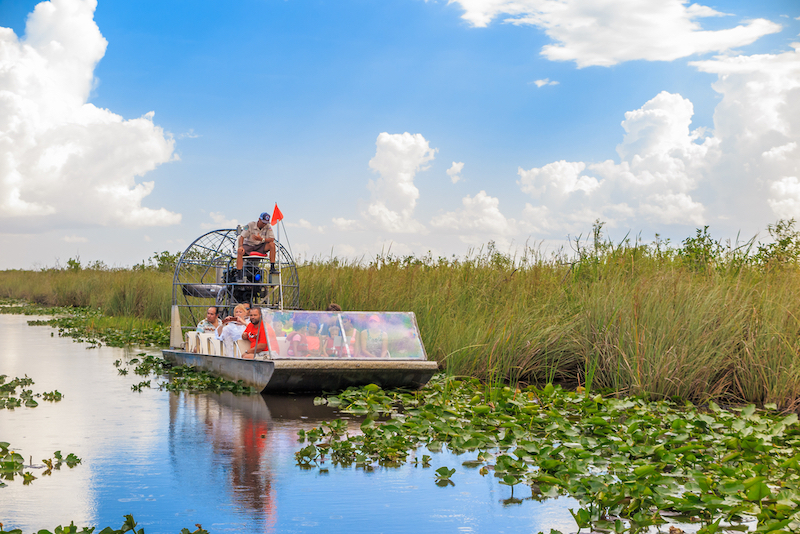 Everglades, Florida - Group of tourists riding an airboat. Photo by Shutterstock.