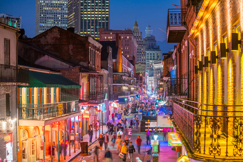 Pubs and bars with neon lights in the French Quarter, New Orleans. Photo by Shutterstock.
