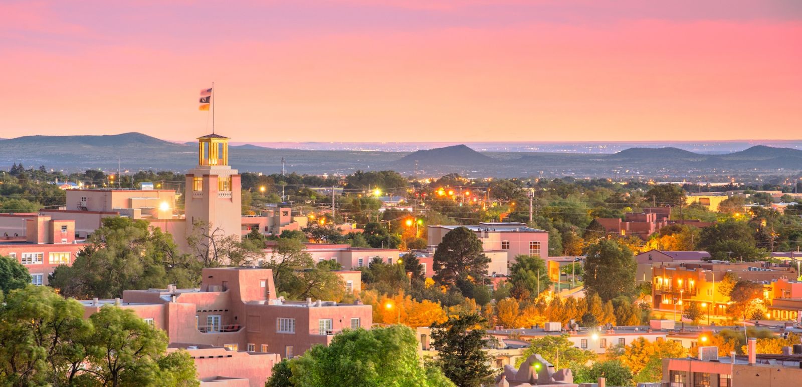 Santa Fe, New Mexico's downtown skyline at dusk. Photo via Shutterstock.