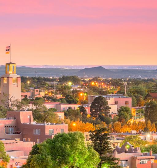 Santa Fe, New Mexico's downtown skyline at dusk. Photo via Shutterstock.