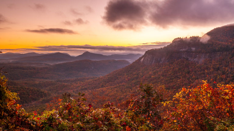 Whiteside Mountain in autumn at dawn in North Carolina. Photo via Shutterstock.