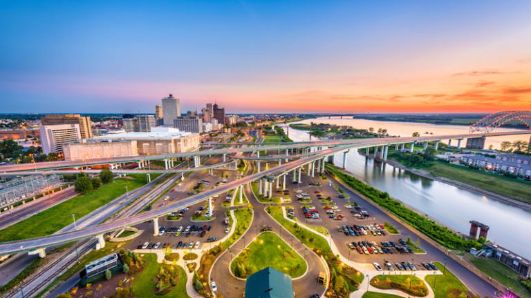Memphis, Tennessee, aerial skyline view with downtown and Mud Island. Photo via Shutterstock.
