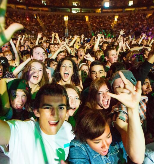 French electronic pop band M83 performs on the main stage at Key Arena during the Bumbershoot music festival in Seattle on September 3, 2012. Photo via Shutterstock.