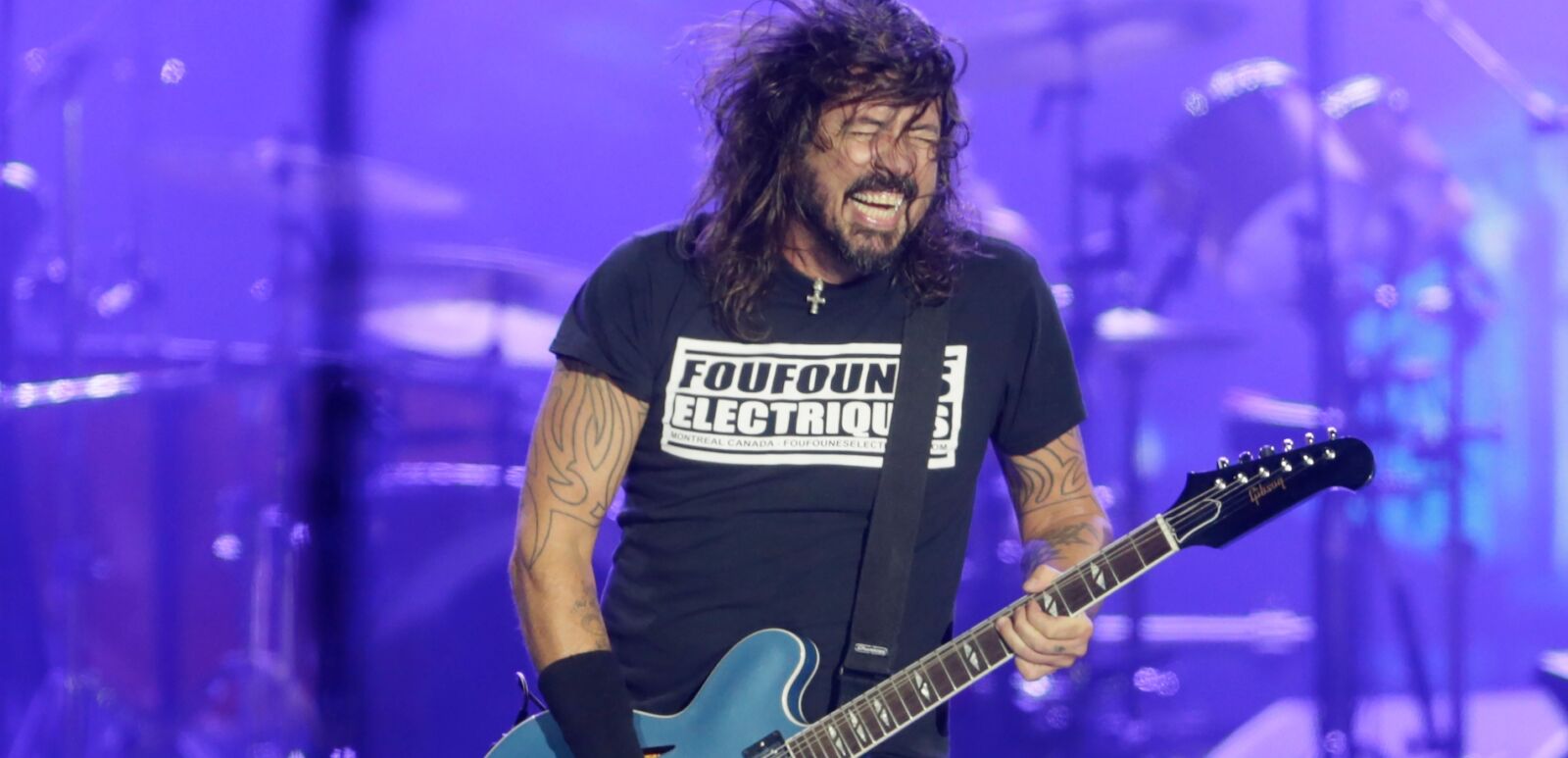 Dave Grohl rocking out with Foo Fighters. Photo via Shutterstock.