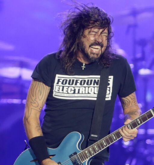 Dave Grohl rocking out with Foo Fighters. Photo via Shutterstock.