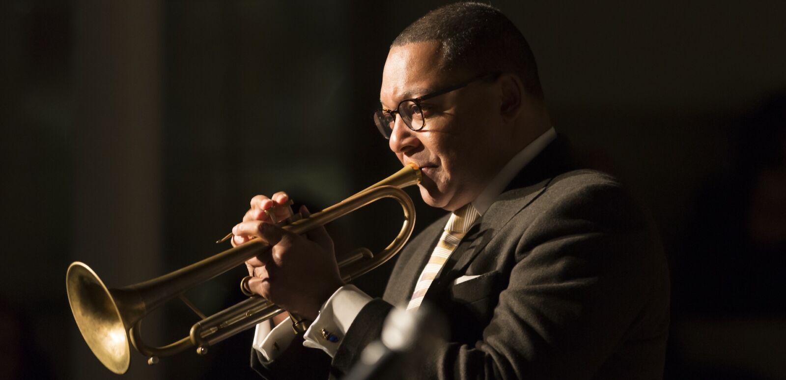 Wynton Marsalis plays trumpet at charity concert Jazz Legends for Disability Pride during Winter Jazz festival at Quaker Friends Meeting Hall. Photo via Shutterstock.