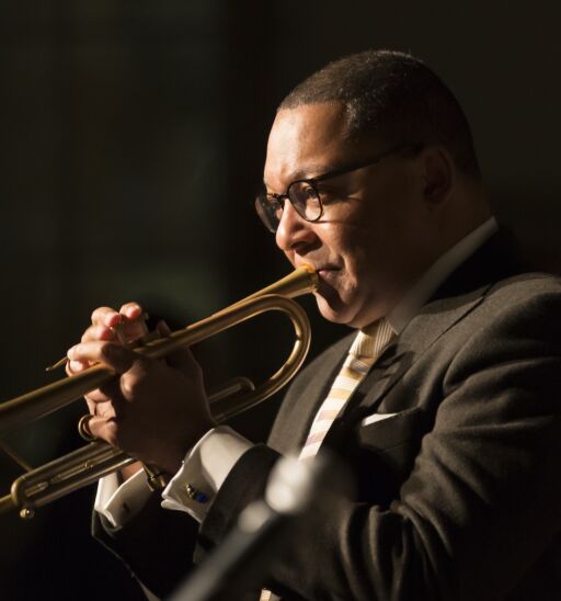 Wynton Marsalis plays trumpet at charity concert Jazz Legends for Disability Pride during Winter Jazz festival at Quaker Friends Meeting Hall. Photo via Shutterstock.
