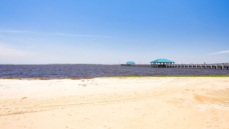 Gulf coast beach in Ocean Springs, Mississippi. Photo by Shutterstock.