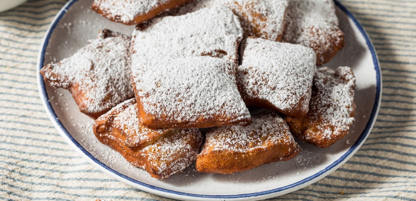 Homemade New Orleans French beignets. Photo via Shutterstock.