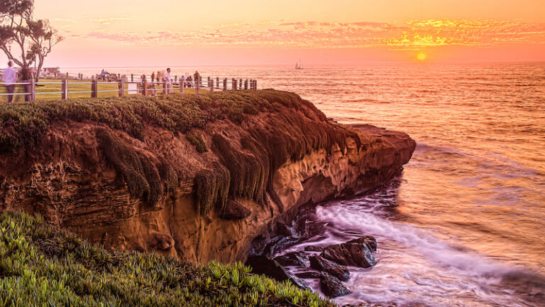Best places for solo travel: San Diego, California. La Jolla Cove at sunset. Photo via Shutterstock.