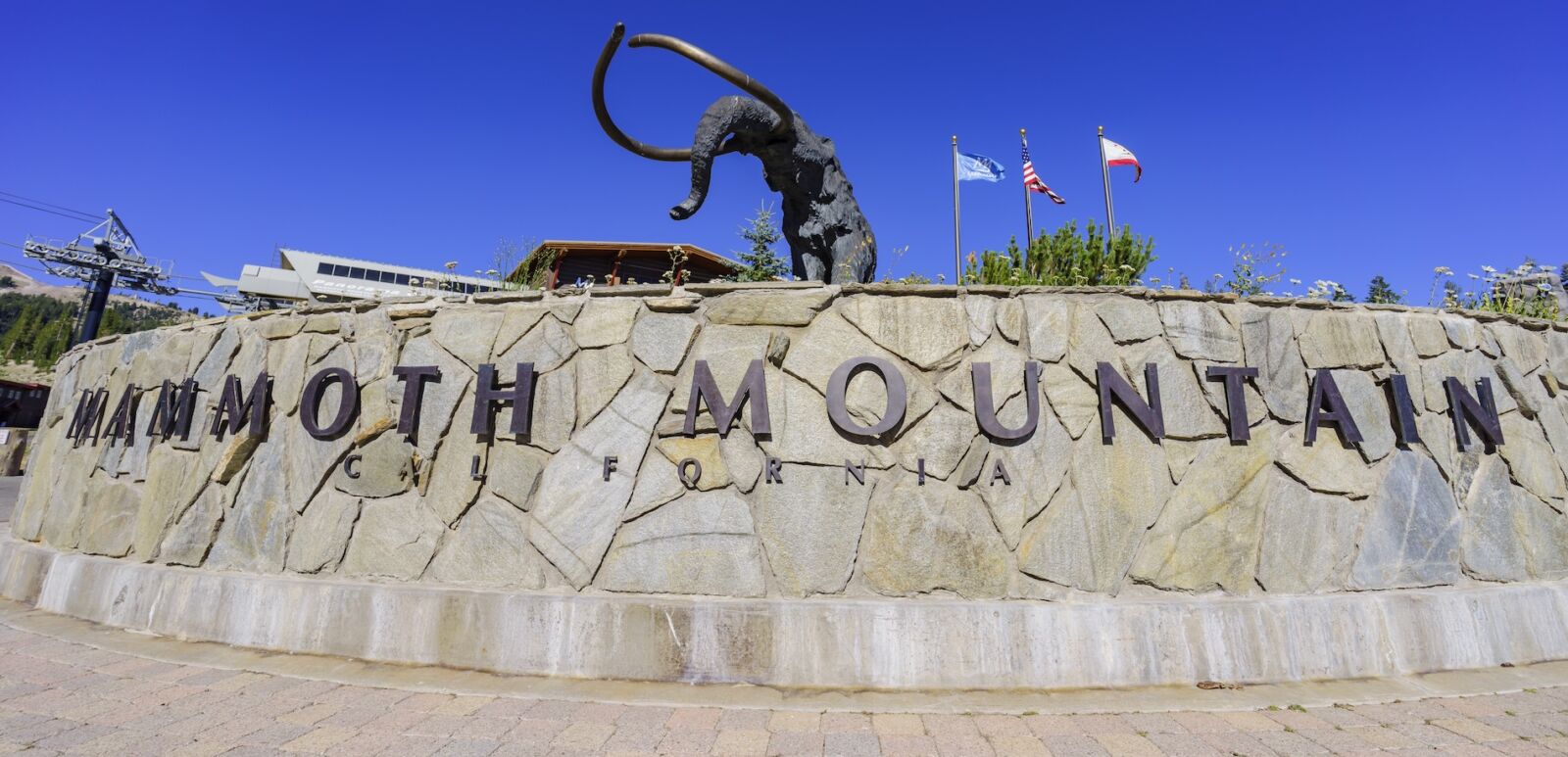 The mammoth statue in Mammoth Lake with blue sky. Photo via Shutterstock.