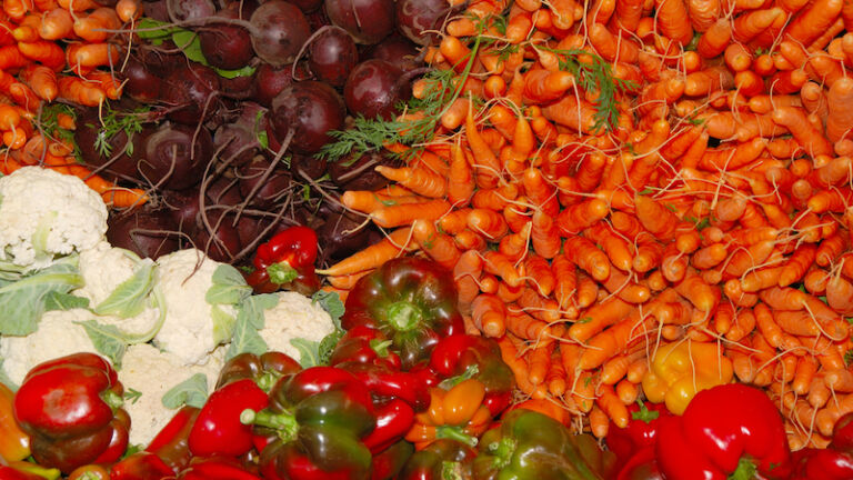 Vegetables, Eugene Saturday Market in downtown Eugene Oregon includes a great farmers market. Photo via Shutterstock.