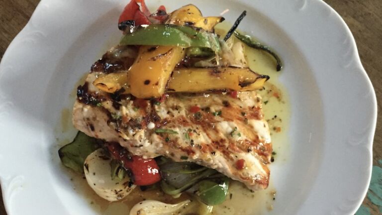 Taylor Swift's favorite restaurants:Via Carota. Pictured: Grilled chicken with vegetable medley at Via Carota.
