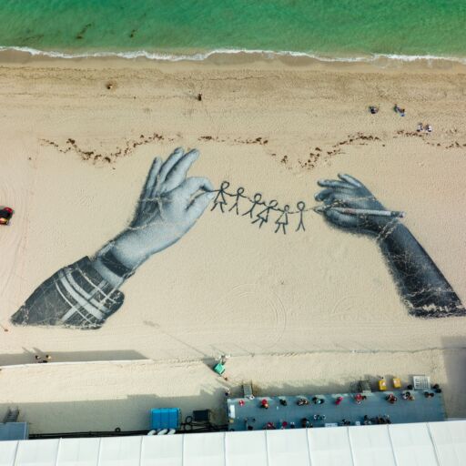 Miami Beach, FL, USA - December 4, 2021: Miami Beach Art Basel on the sand. Photo via Shutterstock.