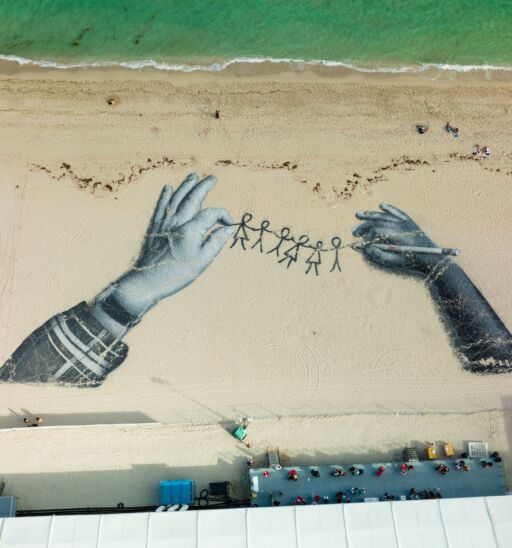 Miami Beach, FL, USA - December 4, 2021: Miami Beach Art Basel on the sand. Photo via Shutterstock.