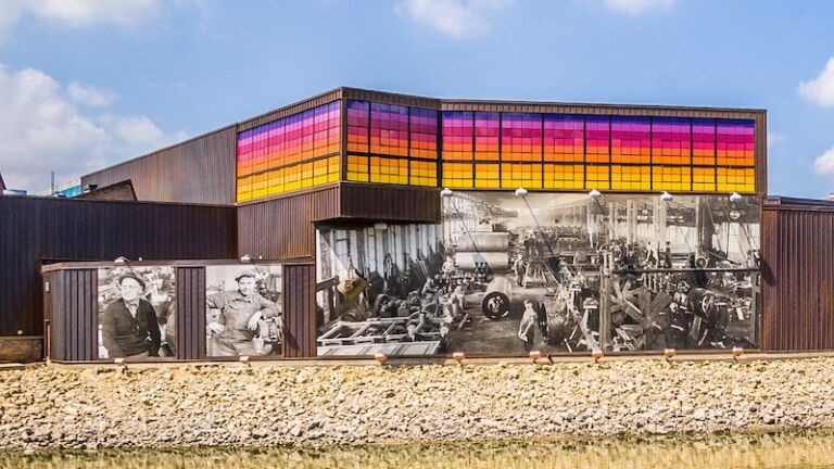 Beloit Iron Works mural at the edge of the Rock River. Photo via Shutterstock.