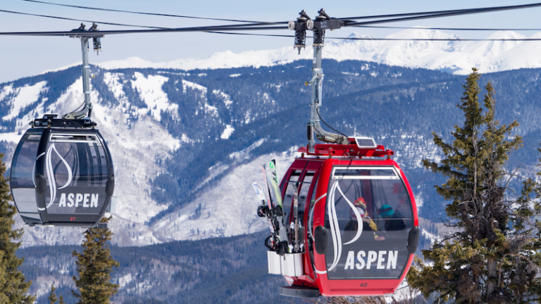 Gondolas delivering skiers for the descent in Aspen.