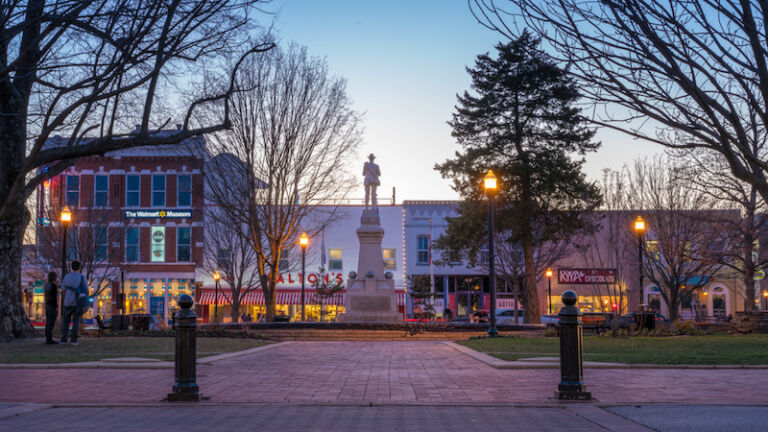 Bentonville, Arkansas United States - March 20, 2009: Sunset over beautiful downtown Bentonville in spring. Photo via Shutterstock.