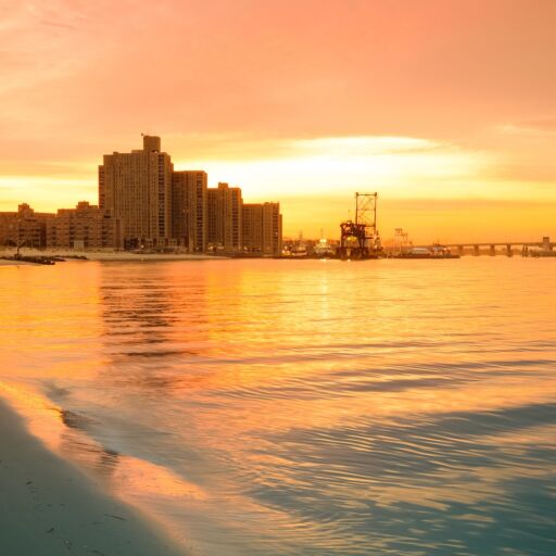 Warm sunrise on the coast. Overlooking the Atlantic Beach Bridge. East rockaway Intel. New-York. US East Coast.