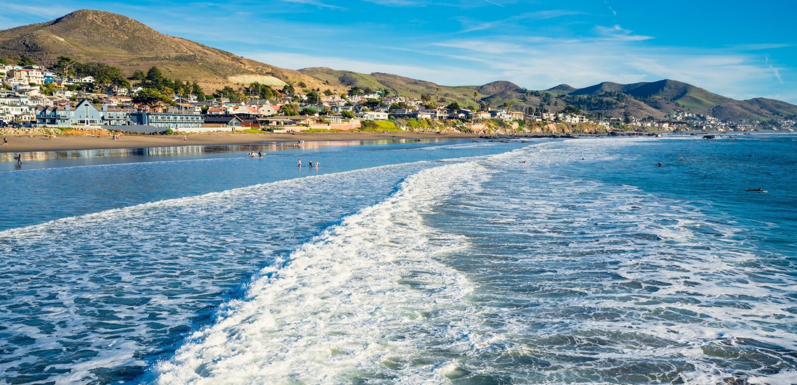 Cayucos State Beach is right on the waterfront in the town of Cayucos, Central Coast of California. Photo via Shutterstock.