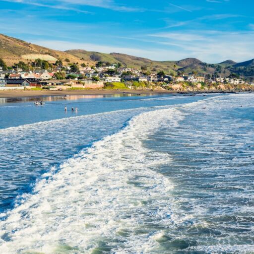 Cayucos State Beach is right on the waterfront in the town of Cayucos, Central Coast of California. Photo via Shutterstock.