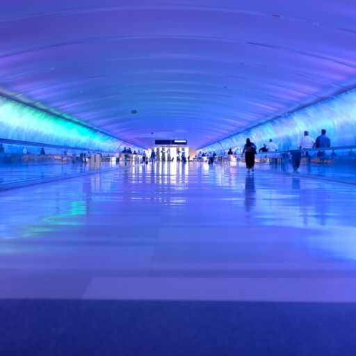 Light Tunnel at DTW-Detroit Metropolitan Wayne County Airport in Michigan, U.S.A.. The LED illuminated 700 foot tunnel connects Concourse A with Concourses B and C and the McNamara Terminal.