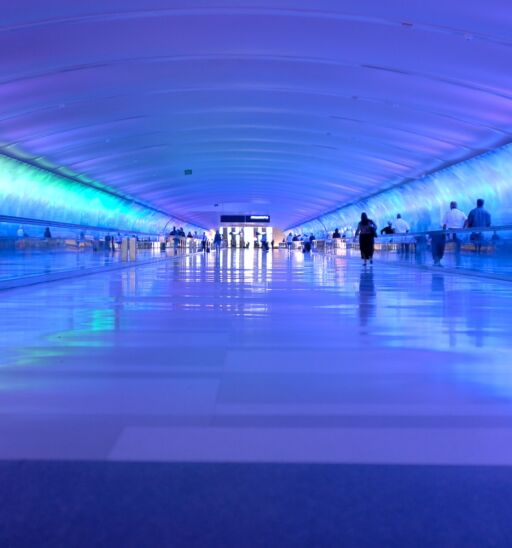 Light Tunnel at DTW-Detroit Metropolitan Wayne County Airport in Michigan, U.S.A.. The LED illuminated 700 foot tunnel connects Concourse A with Concourses B and C and the McNamara Terminal.