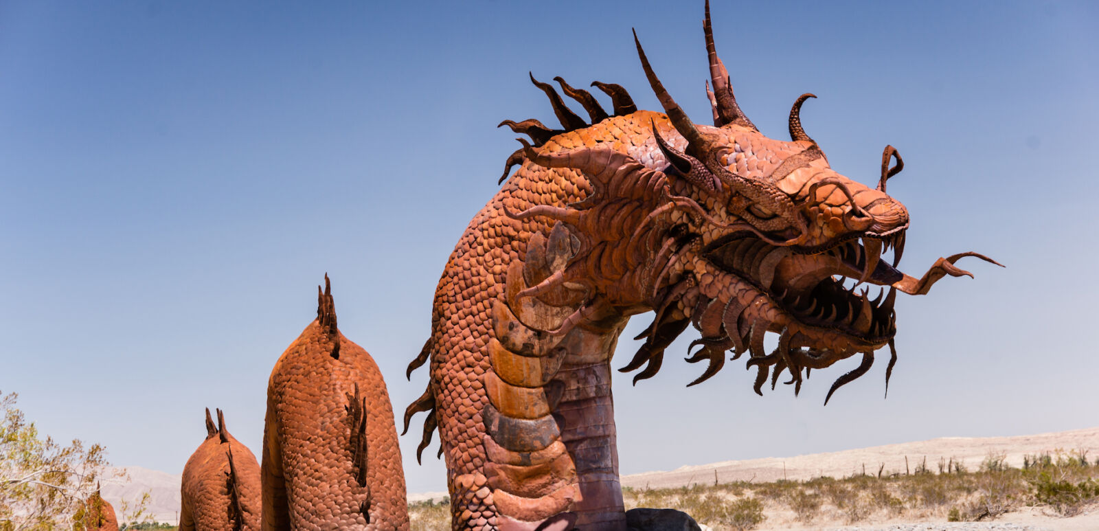 a 350-foot long Serpent sculpture to the collection of prehistoric animals on display at Galetta Meadows. Photo via Shutterstock.