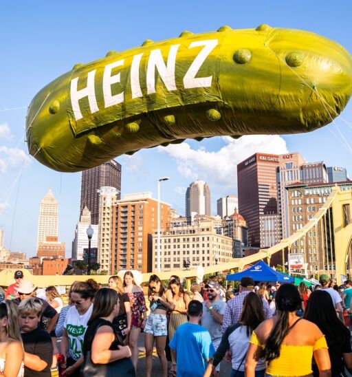 People gather on the Roberto Clemente Bridge for the annual Picklesburgh event.